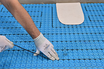 CT floor heating mats being installed in a Prodeso membrane A heated floor using Prodeso and ComfortTile heat cable being installed in bathroom.